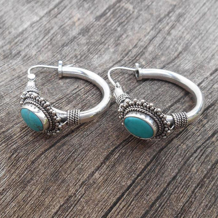"Vintage Τουρκουάζ Σκουλαρίκια" can be rewritten as "Retro Τουρκουάζ Σκουλαρίκια".